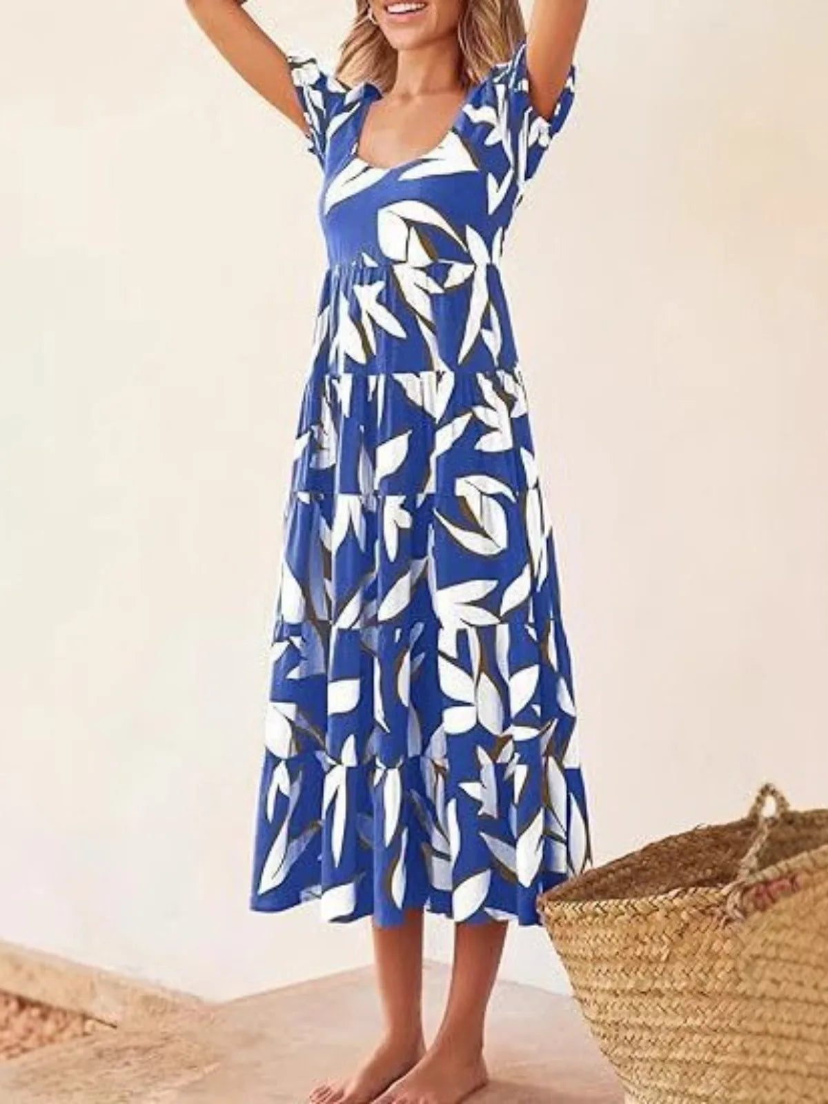 Puff-sleeved gathered open-back printed tiered short-sleeve dress
