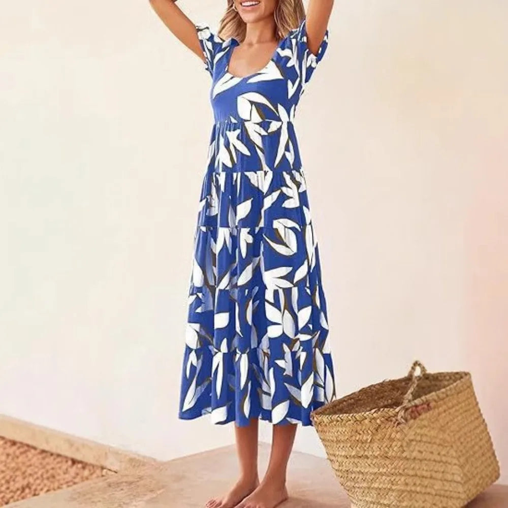 Puff-sleeved gathered open-back printed tiered short-sleeve dress